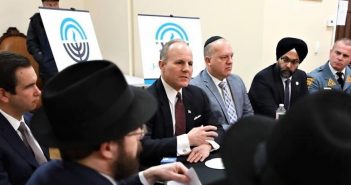 Onsite at kosher market in Jersey City, Elan Carr visits a community in pain